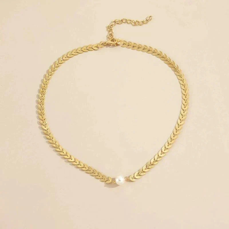 Collar griego with perla in oro
