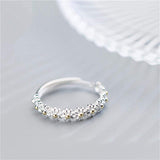 Anillo adjustable of plata and esmaltes pintados a hand with margaritas