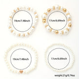 Set of elegant pulseras in shape of corazón with perlas